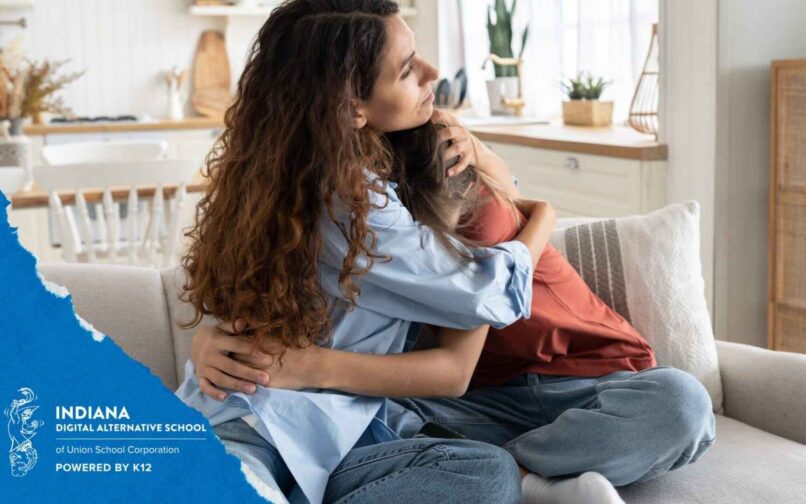 woman hugging little kid