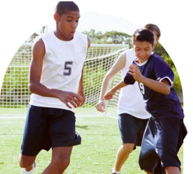 Students playing soccer