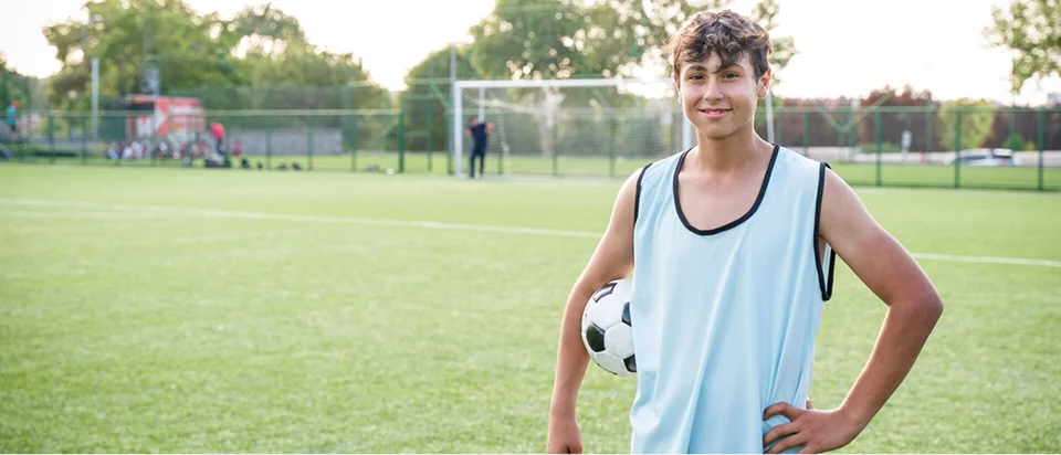 Student with a soccer ball