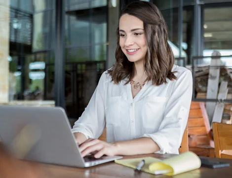 Student working with her laptop