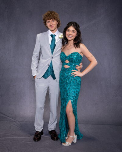 students with formal dresses at the prom